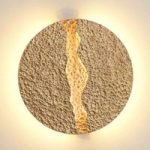 Eruption – rund guldfarvet LED-væglampe