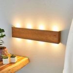 Maja – dæmpbar LED væglampe med overflade i rust
